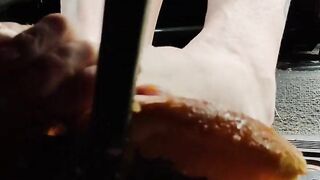 Busting open whole oranges with my BareFeet on my break pedal back pov so you can see it squirt