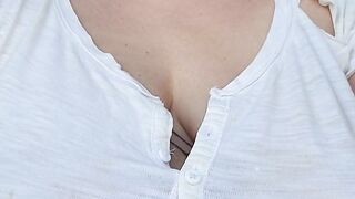playing with my boobs by the window