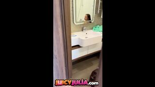 Juicy Julia peeing in bathroom and showing her big tits